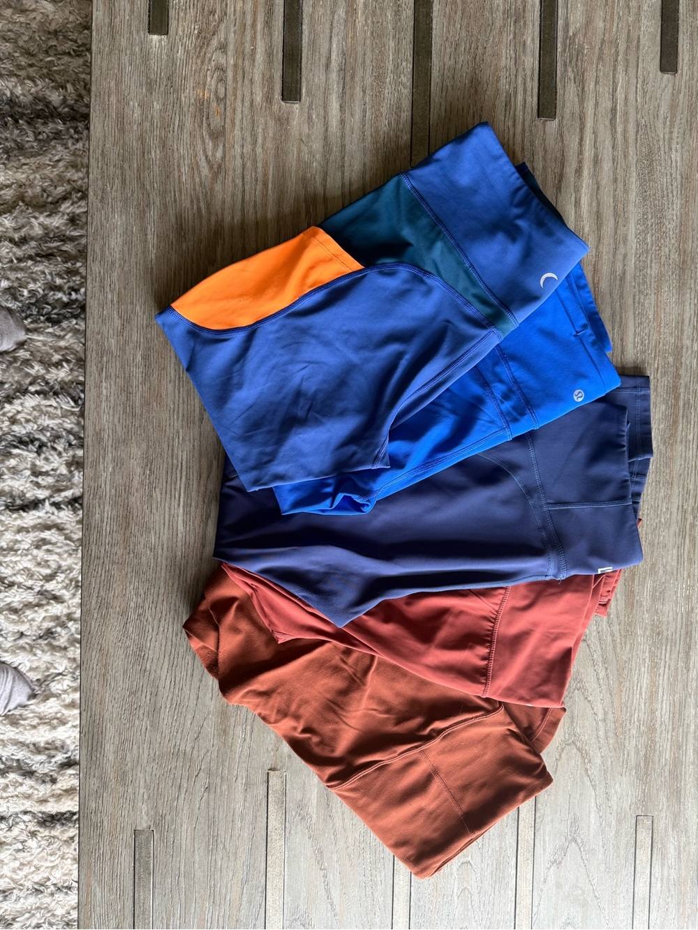 Bundle of blue and rust brown leggings